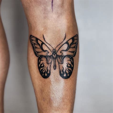 guy butterfly tattoo